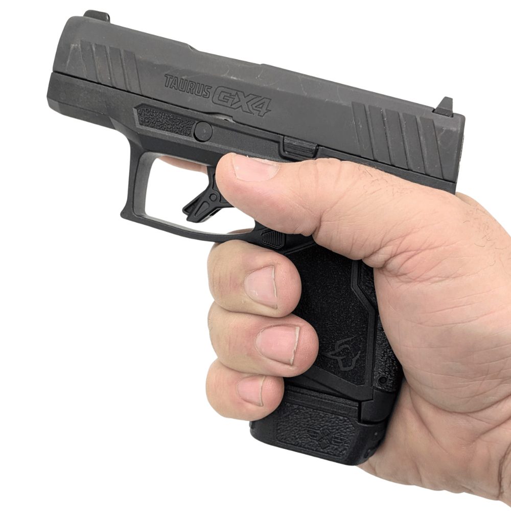 XTech GX4 grip extension installed and showing additional grip provided holding the GX4 pistol