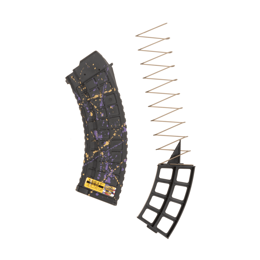 Waffle splatter AK magazine upright facing left. 10 round blocker is to the right